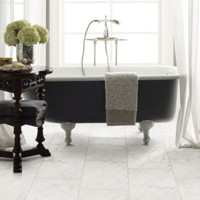 porcelain tile floors in a bright white Maryland bathroom